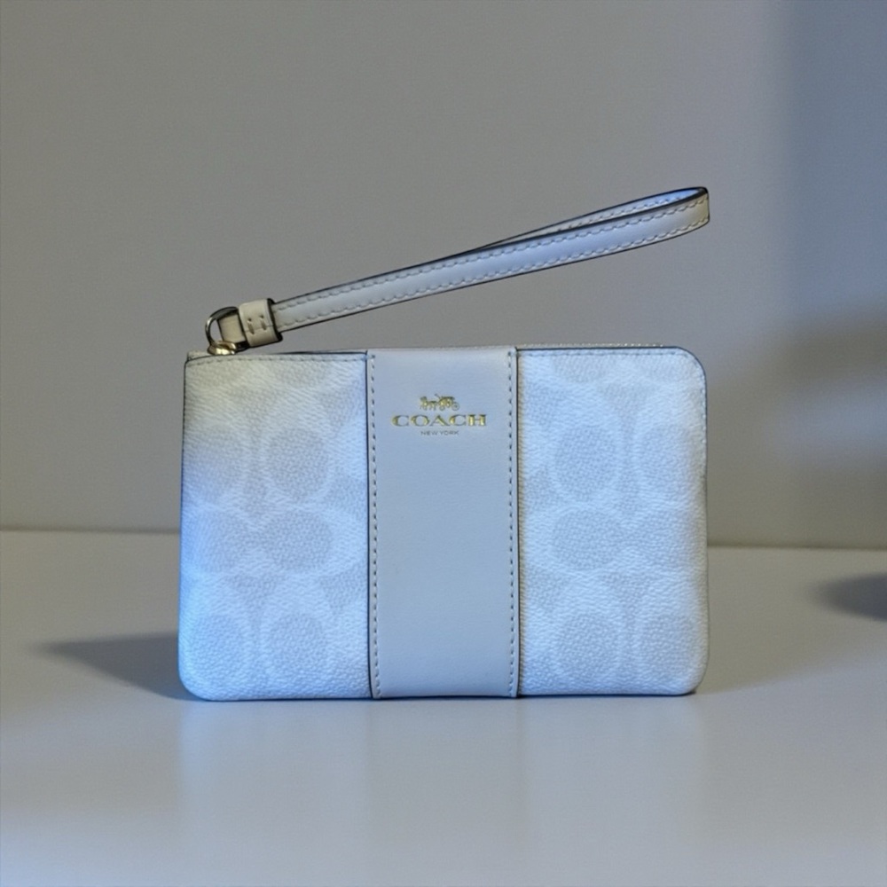 Coach Cream Wristlet with Gold Accents